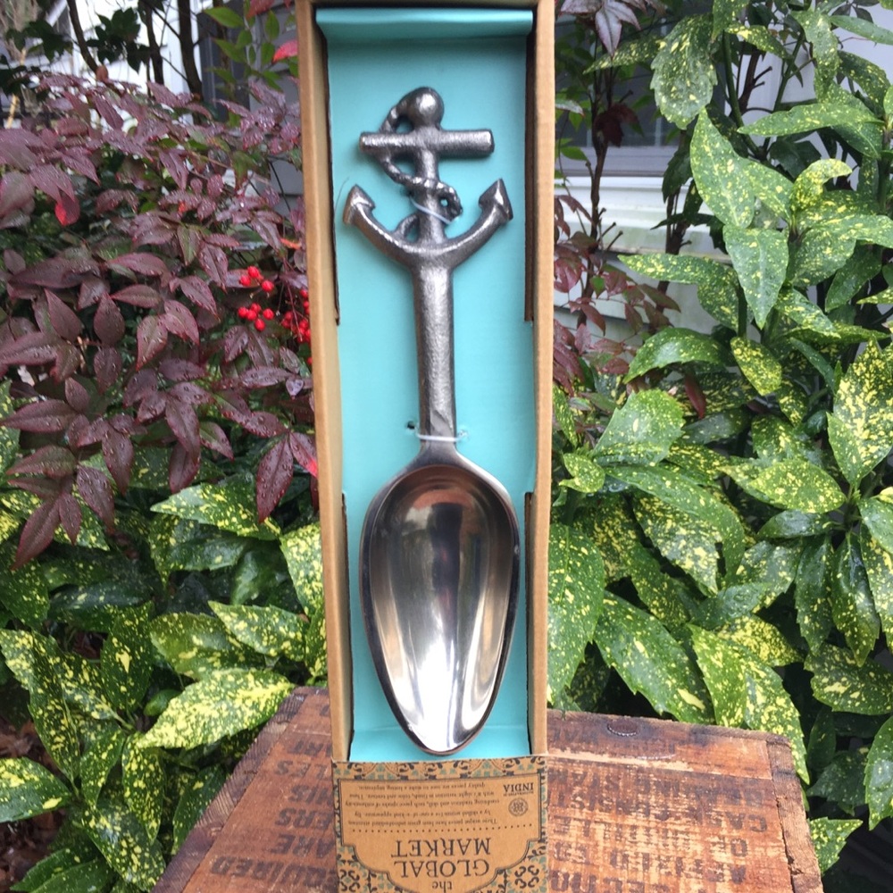 The Global Market silver anchor serving spoon